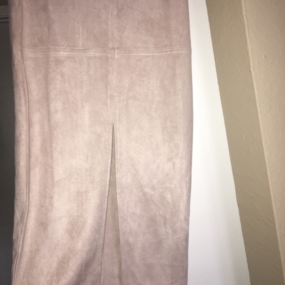 Light pink suede midi skirt with slit